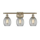 Eaton Bath Vanity Light shown in the Antique Brass finish with a Clear shade