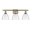 Ballston Dome Bath Vanity Light shown in the Antique Brass finish with a Seedy shade