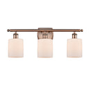 Cobbleskill Bath Vanity Light shown in the Antique Copper finish with a Matte White shade