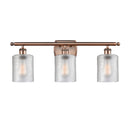 Cobbleskill Bath Vanity Light shown in the Antique Copper finish with a Clear shade