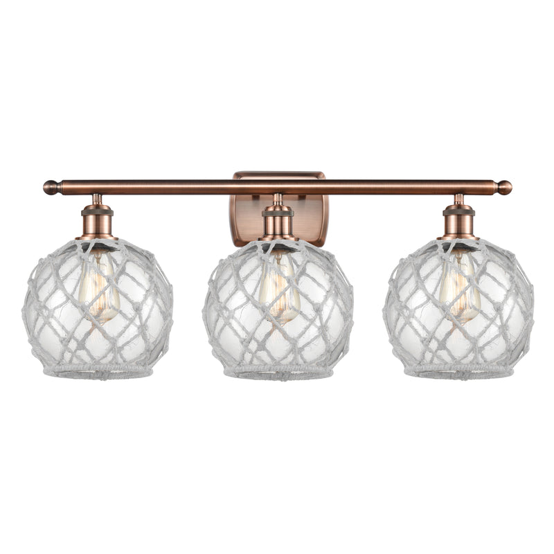 Farmhouse Rope Bath Vanity Light shown in the Antique Copper finish with a Clear Glass with White Rope shade