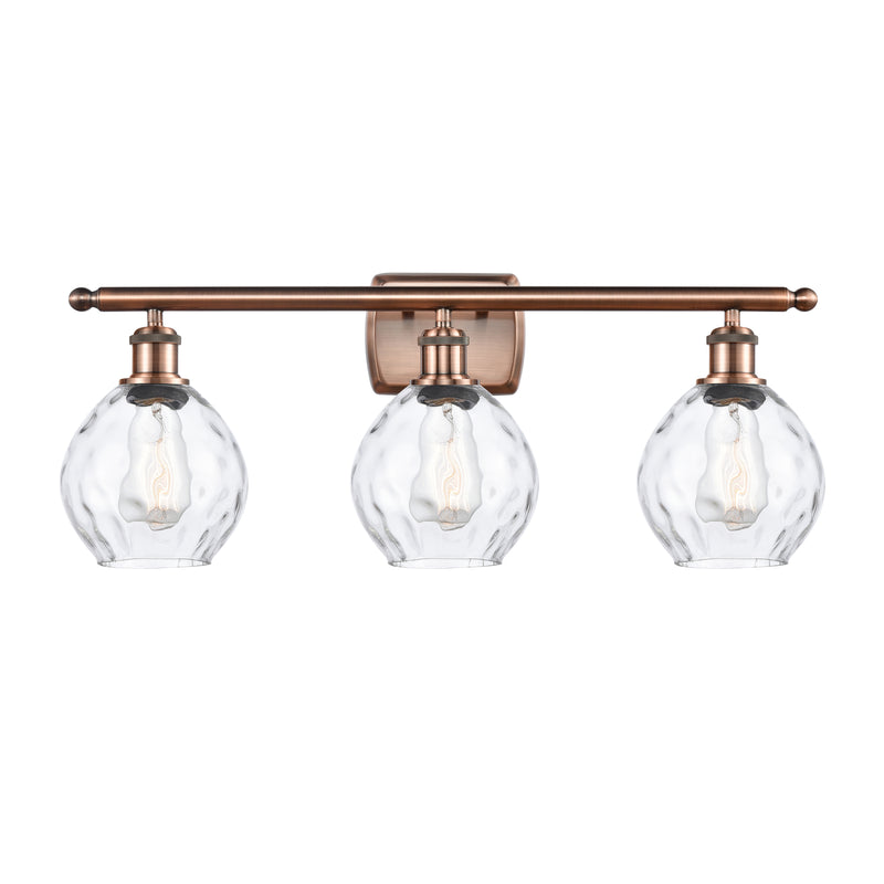 Waverly Bath Vanity Light shown in the Antique Copper finish with a Clear shade