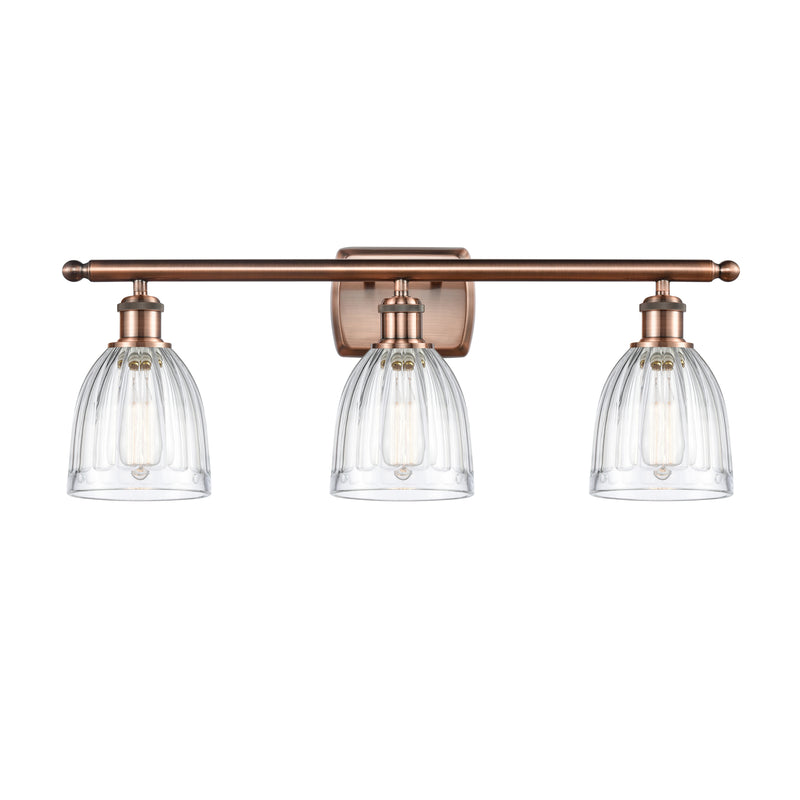 Brookfield Bath Vanity Light shown in the Antique Copper finish with a Clear shade