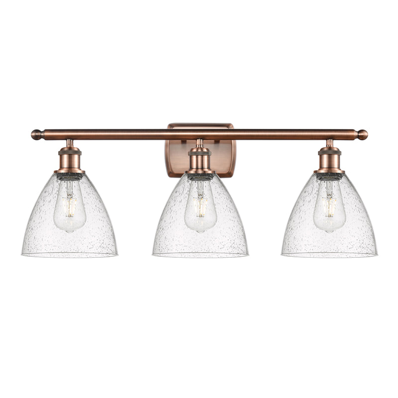 Ballston Dome Bath Vanity Light shown in the Antique Copper finish with a Seedy shade