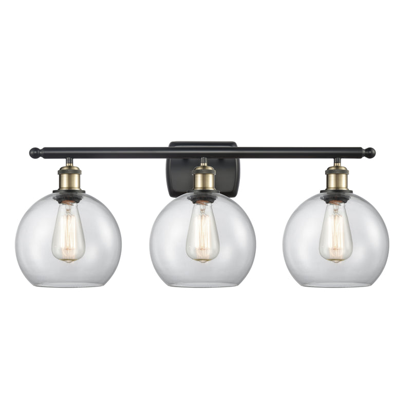 Athens Bath Vanity Light shown in the Black Antique Brass finish with a Clear shade