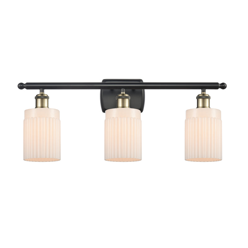 Hadley Bath Vanity Light shown in the Black Antique Brass finish with a Matte White shade