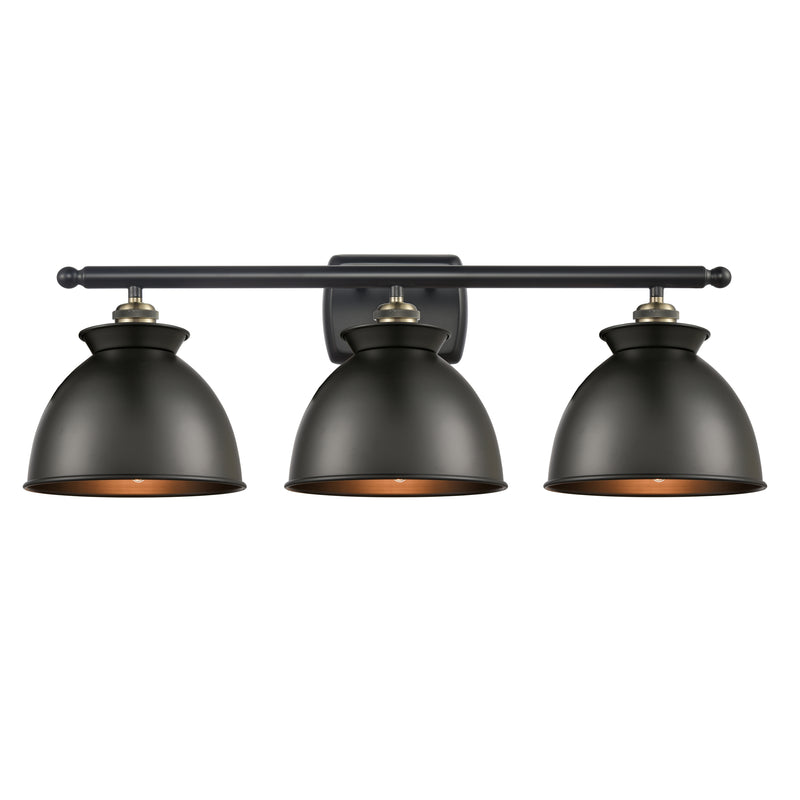 Adirondack Bath Vanity Light shown in the Black Antique Brass finish with a Matte Black shade