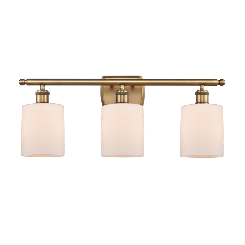 Cobbleskill Bath Vanity Light shown in the Brushed Brass finish with a Matte White shade