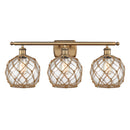 Farmhouse Rope Bath Vanity Light shown in the Brushed Brass finish with a Clear Glass with Brown Rope shade