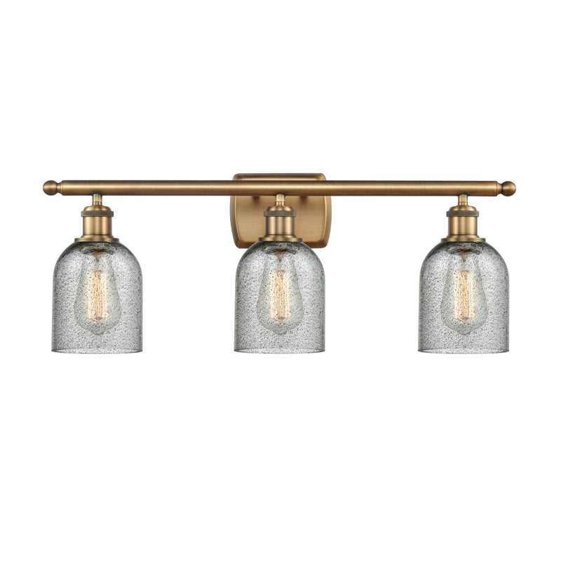 Caledonia Bath Vanity Light shown in the Brushed Brass finish with a Charcoal shade