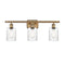 Hadley Bath Vanity Light shown in the Brushed Brass finish with a Clear shade