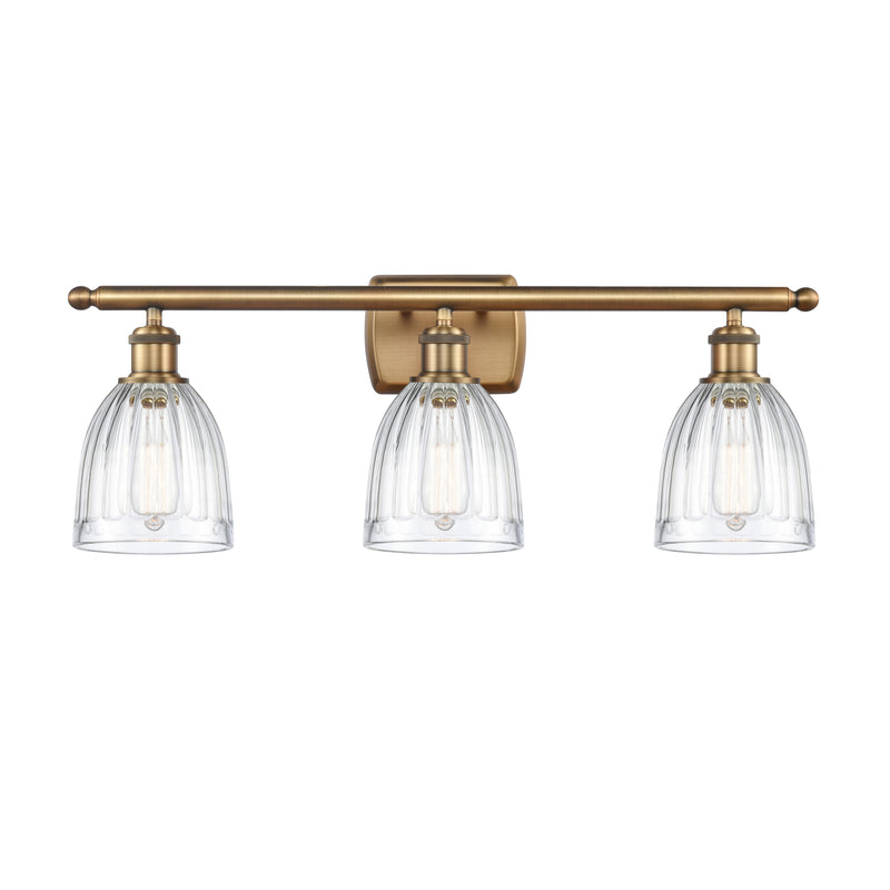 Brookfield Bath Vanity Light shown in the Brushed Brass finish with a Clear shade