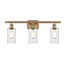 Clymer Bath Vanity Light shown in the Brushed Brass finish with a Clear shade