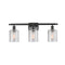 Cobbleskill Bath Vanity Light shown in the Matte Black finish with a Clear shade