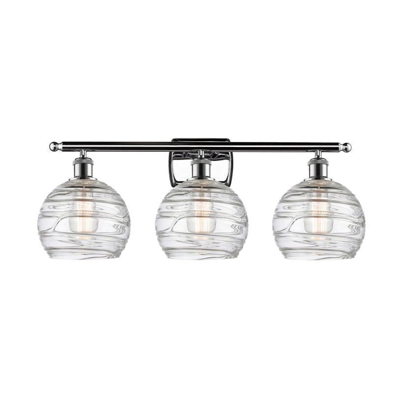 Deco Swirl Bath Vanity Light shown in the Polished Chrome finish with a Clear shade