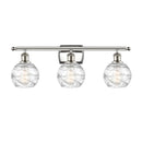 Deco Swirl Bath Vanity Light shown in the Polished Nickel finish with a Clear shade