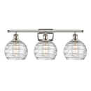 Deco Swirl Bath Vanity Light shown in the Polished Nickel finish with a Clear shade