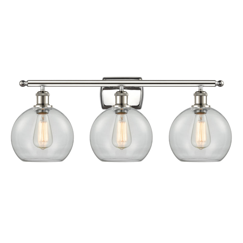 Athens Bath Vanity Light shown in the Polished Nickel finish with a Clear shade