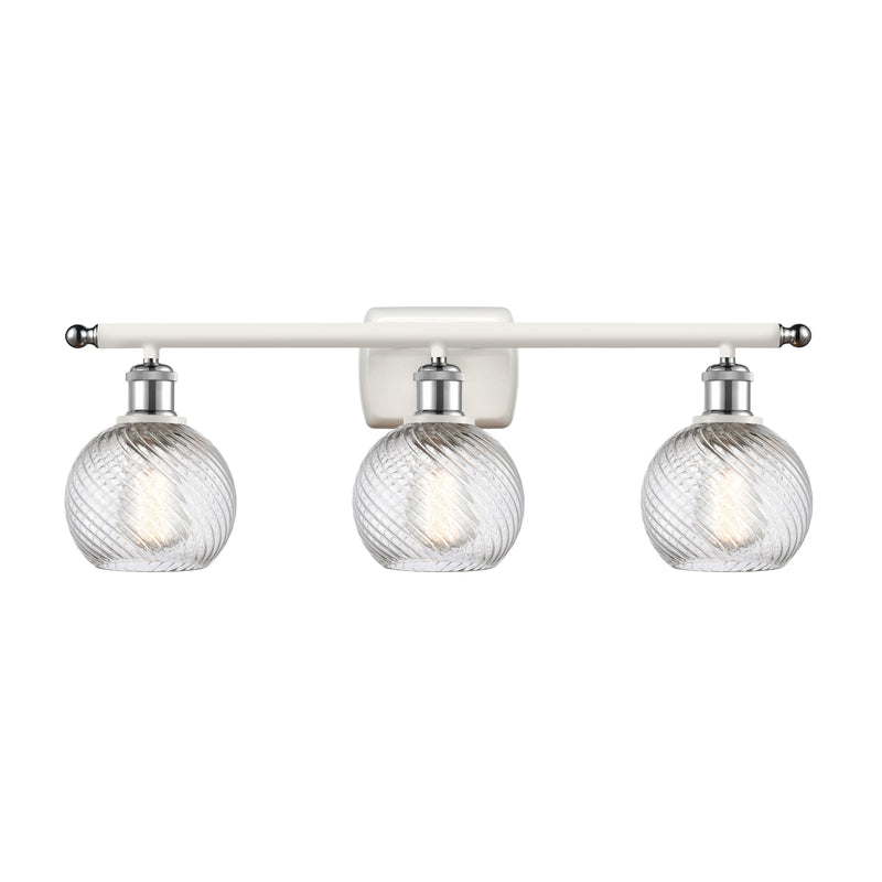 Deco Swirl Bath Vanity Light shown in the White and Polished Chrome finish with a Clear shade