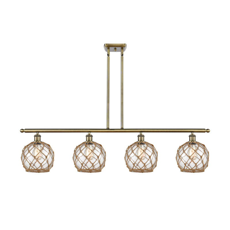 Farmhouse Rope Island Light shown in the Antique Brass finish with a Clear Glass with Brown Rope shade