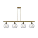 Athens Island Light shown in the Antique Brass finish with a Clear shade