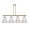 Springwater Island Light shown in the Antique Brass finish with a Clear Spiral Fluted shade