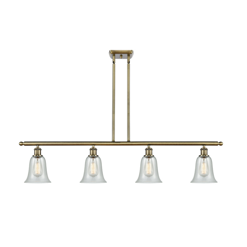 Hanover Island Light shown in the Antique Brass finish with a Fishnet shade