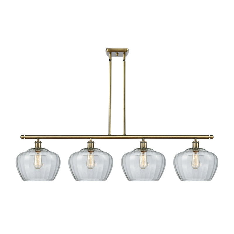 Fenton Island Light shown in the Antique Brass finish with a Clear shade