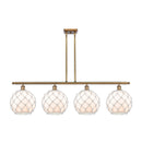 Farmhouse Rope Island Light shown in the Brushed Brass finish with a White Glass with White Rope shade