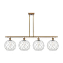 Farmhouse Rope Island Light shown in the Brushed Brass finish with a Clear Glass with White Rope shade