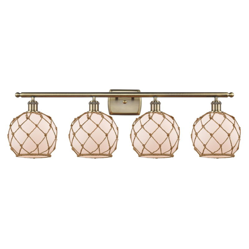 Farmhouse Rope Bath Vanity Light shown in the Antique Brass finish with a White Glass with Brown Rope shade