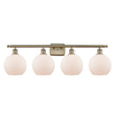 Athens Bath Vanity Light shown in the Antique Brass finish with a Matte White shade