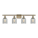 Caledonia Bath Vanity Light shown in the Antique Brass finish with a Charcoal shade