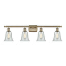 Hanover Bath Vanity Light shown in the Antique Brass finish with a Fishnet shade