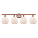 Athens Bath Vanity Light shown in the Antique Copper finish with a Matte White shade