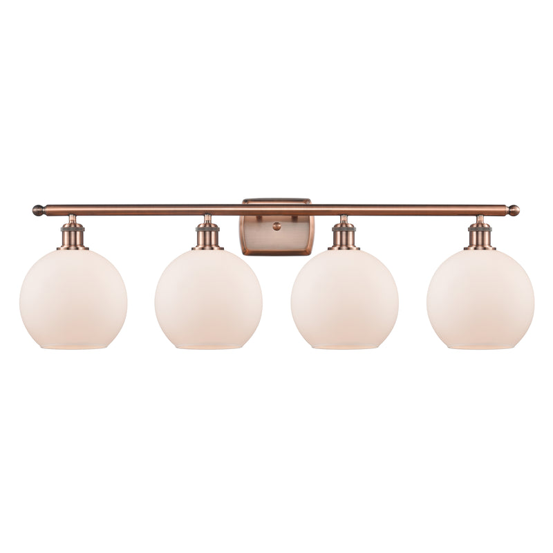 Athens Bath Vanity Light shown in the Antique Copper finish with a Matte White shade