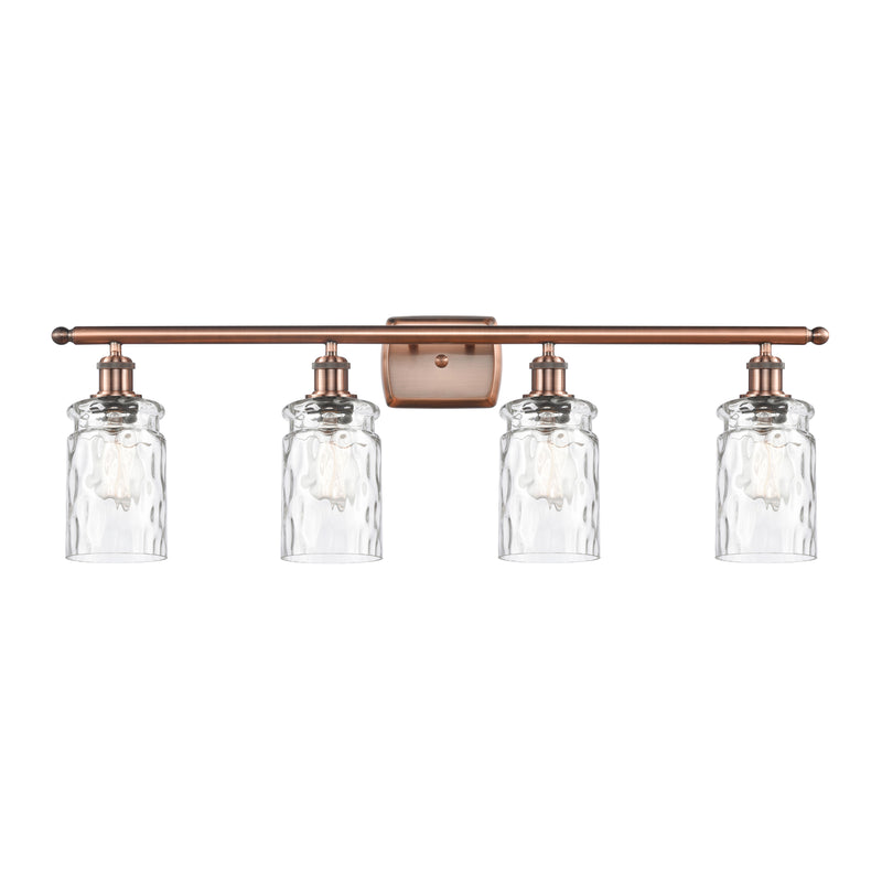 Candor Bath Vanity Light shown in the Antique Copper finish with a Clear Waterglass shade