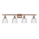 Castile Bath Vanity Light shown in the Antique Copper finish with a Clear shade