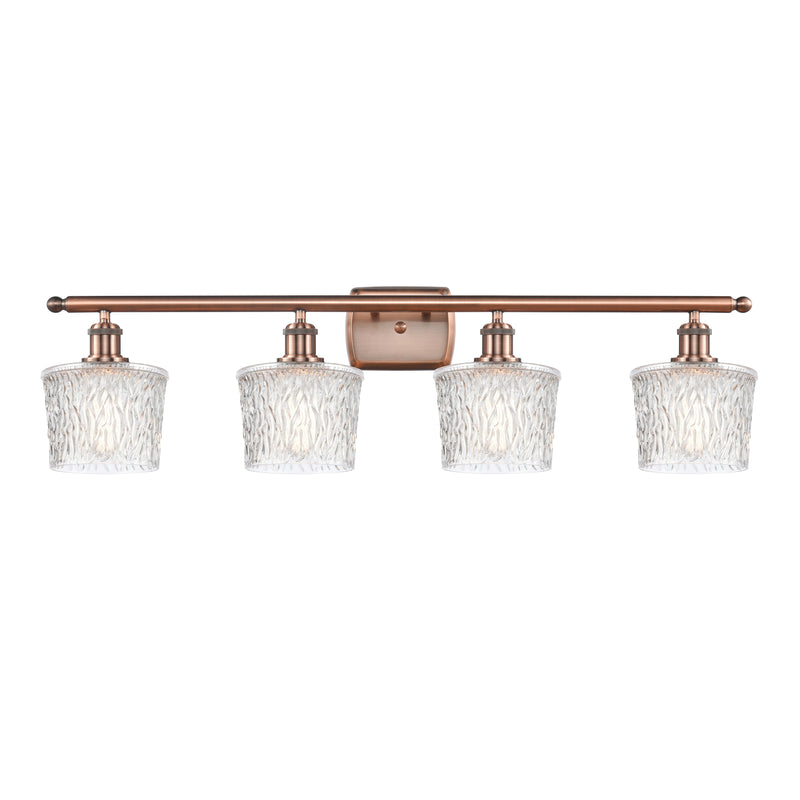 Niagra Bath Vanity Light shown in the Antique Copper finish with a Clear shade