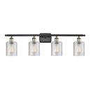 Cobbleskill Bath Vanity Light shown in the Black Antique Brass finish with a Clear shade