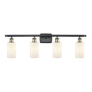 Clymer Bath Vanity Light shown in the Black Antique Brass finish with a Matte White shade