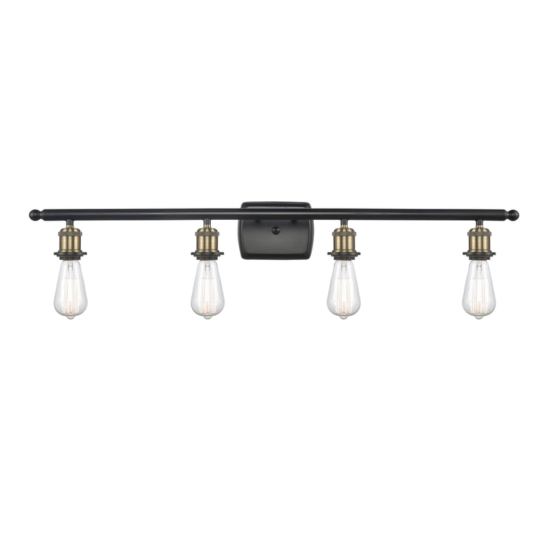 Bare Bulb Bath Vanity Light shown in the Black Antique Brass finish