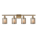 Cobbleskill Bath Vanity Light shown in the Brushed Brass finish with a Mercury shade