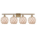 Farmhouse Rope Bath Vanity Light shown in the Brushed Brass finish with a White Glass with Brown Rope shade