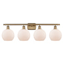 Athens Bath Vanity Light shown in the Brushed Brass finish with a Matte White shade