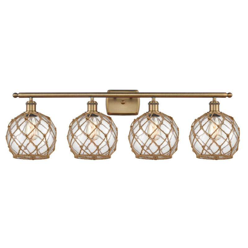 Farmhouse Rope Bath Vanity Light shown in the Brushed Brass finish with a Clear Glass with Brown Rope shade