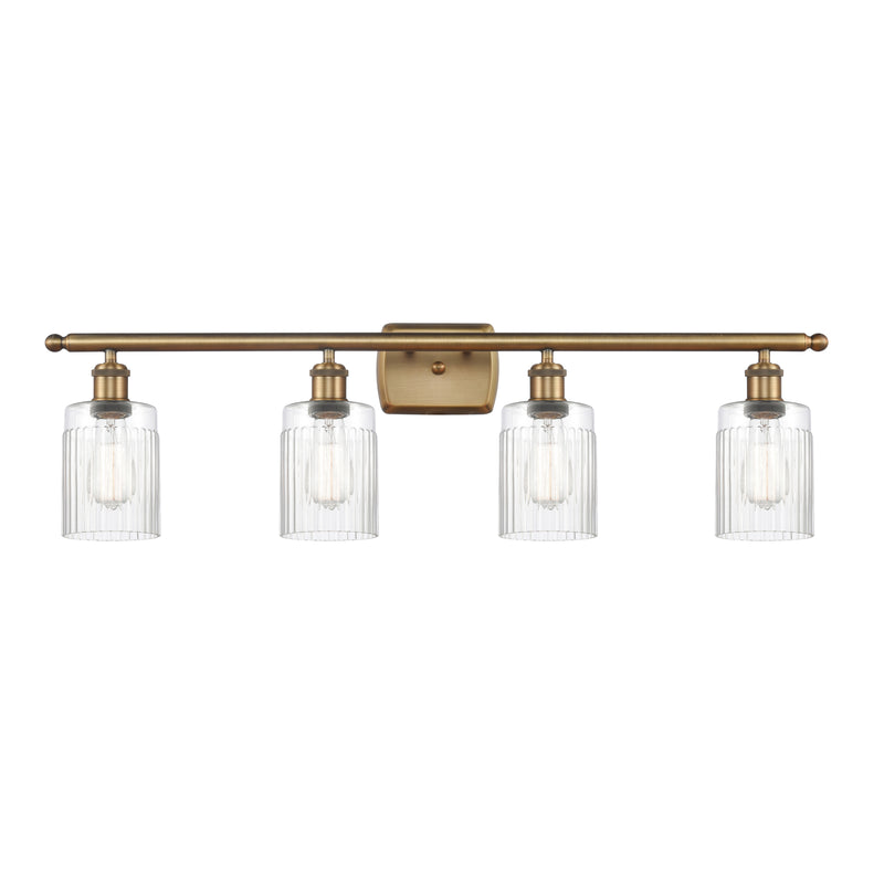 Hadley Bath Vanity Light shown in the Brushed Brass finish with a Clear shade