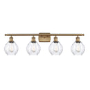 Waverly Bath Vanity Light shown in the Brushed Brass finish with a Clear shade