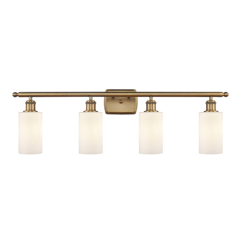 Clymer Bath Vanity Light shown in the Brushed Brass finish with a Matte White shade