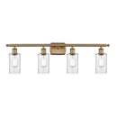 Clymer Bath Vanity Light shown in the Brushed Brass finish with a Clear shade